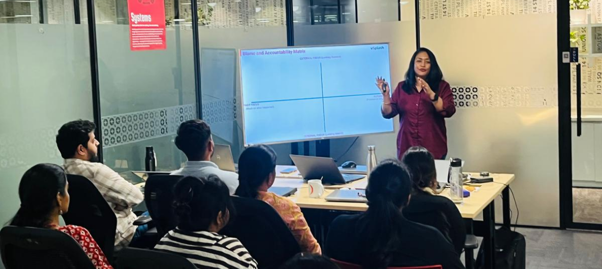 Office training session with presenter and attendees